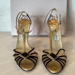 Gold and black Jimmy Choo sandals